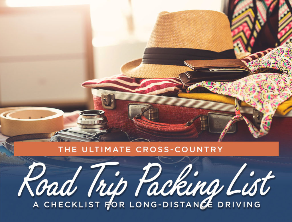 Travel concept photo of open packed suitcase with text reading The Ultimate Cross-Country Road Trip Packing List