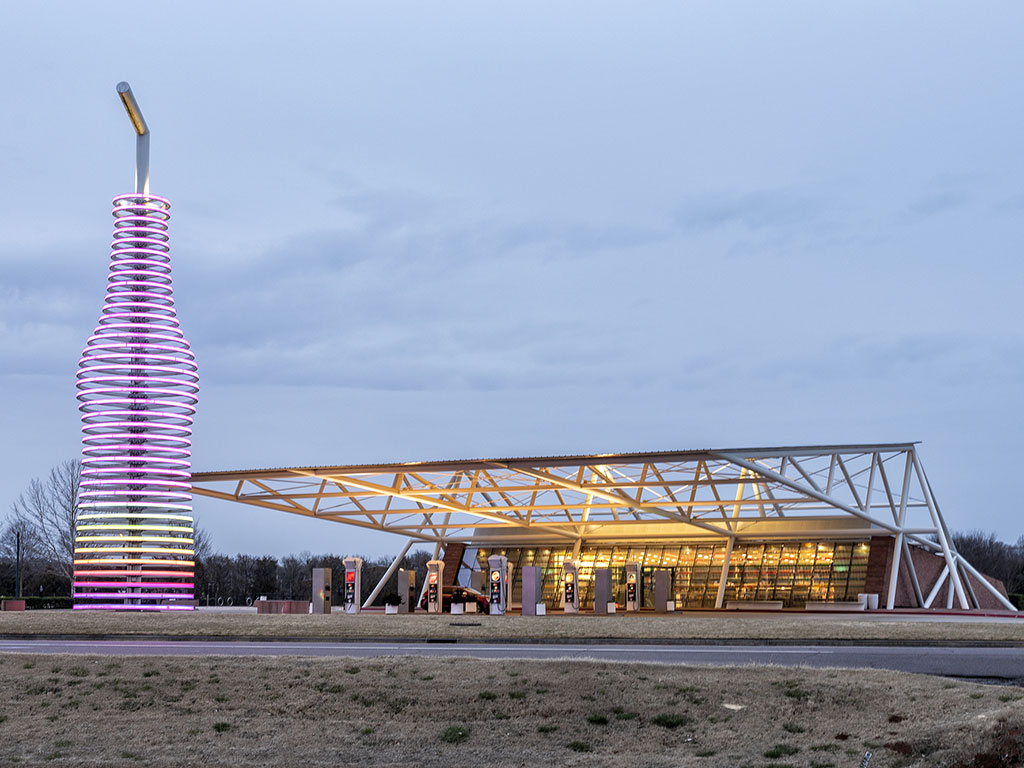 giant soda bottle construction next to a gas station at pops in arcadia oklahoma